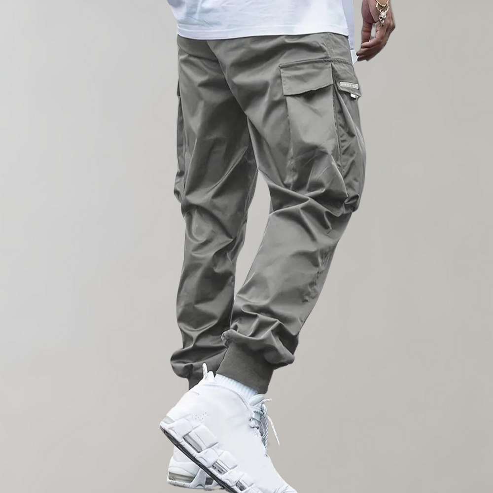 Herren Cargo Jogginghose – Lila Streetwear-Hose mit Reißverschlusstaschen & Bündchen