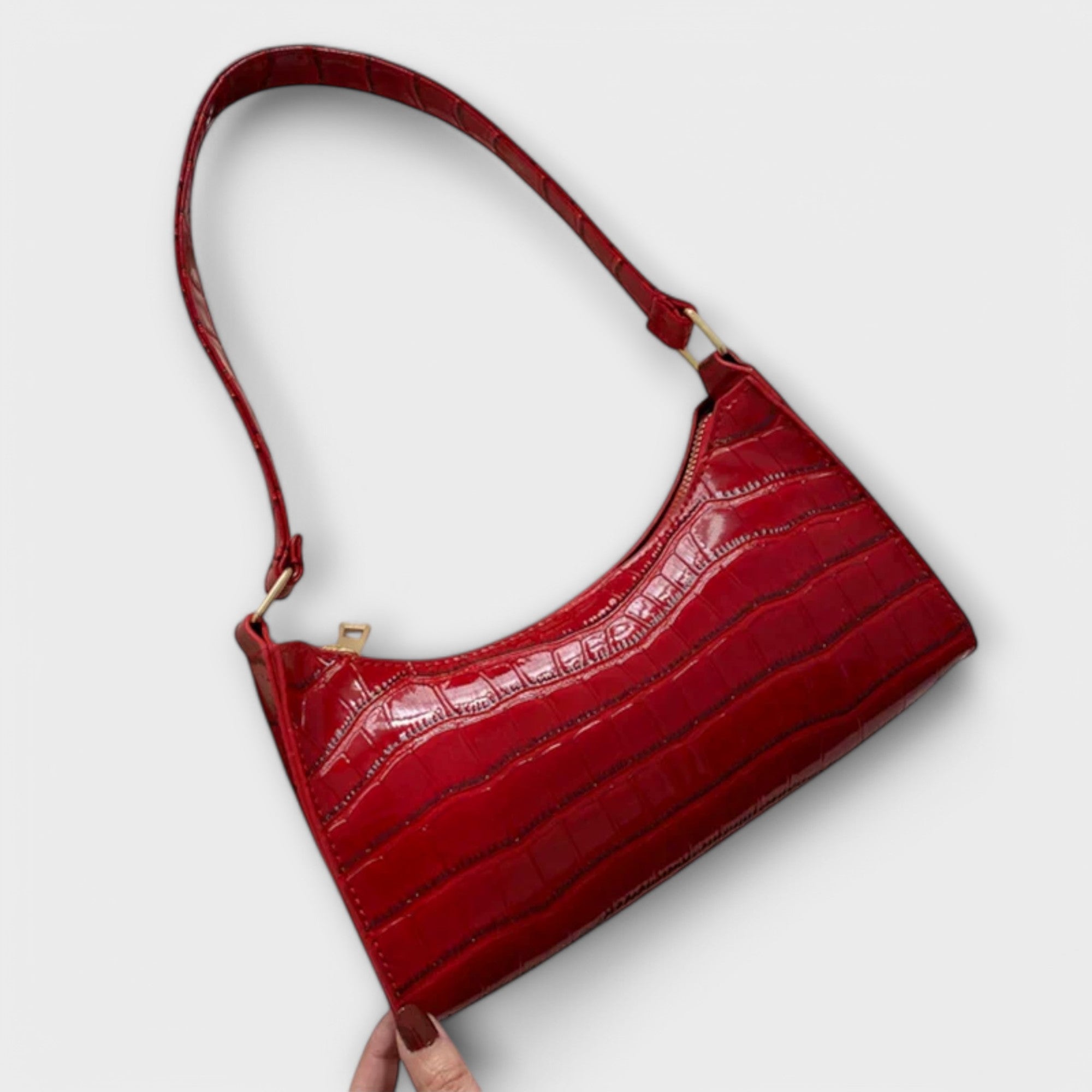 Aurora. - Glänzende Ledertasche