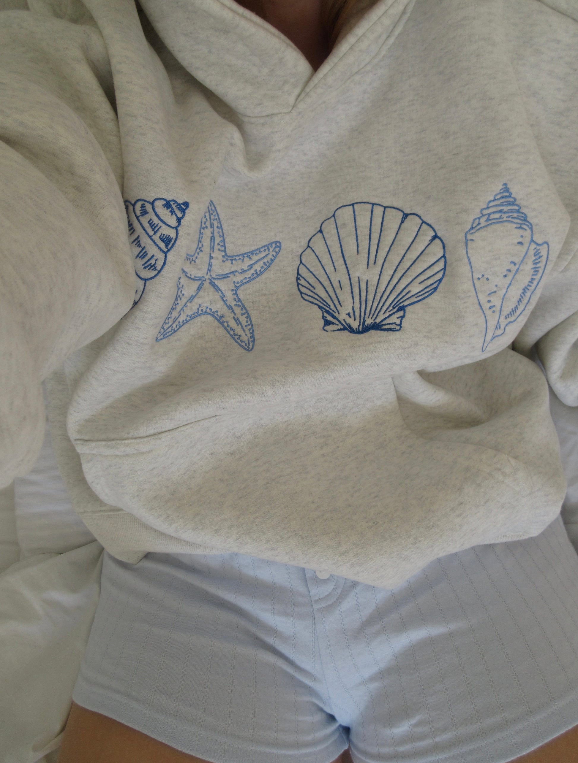 Ocenia | Unisex-Sweatshirt mit Muscheln