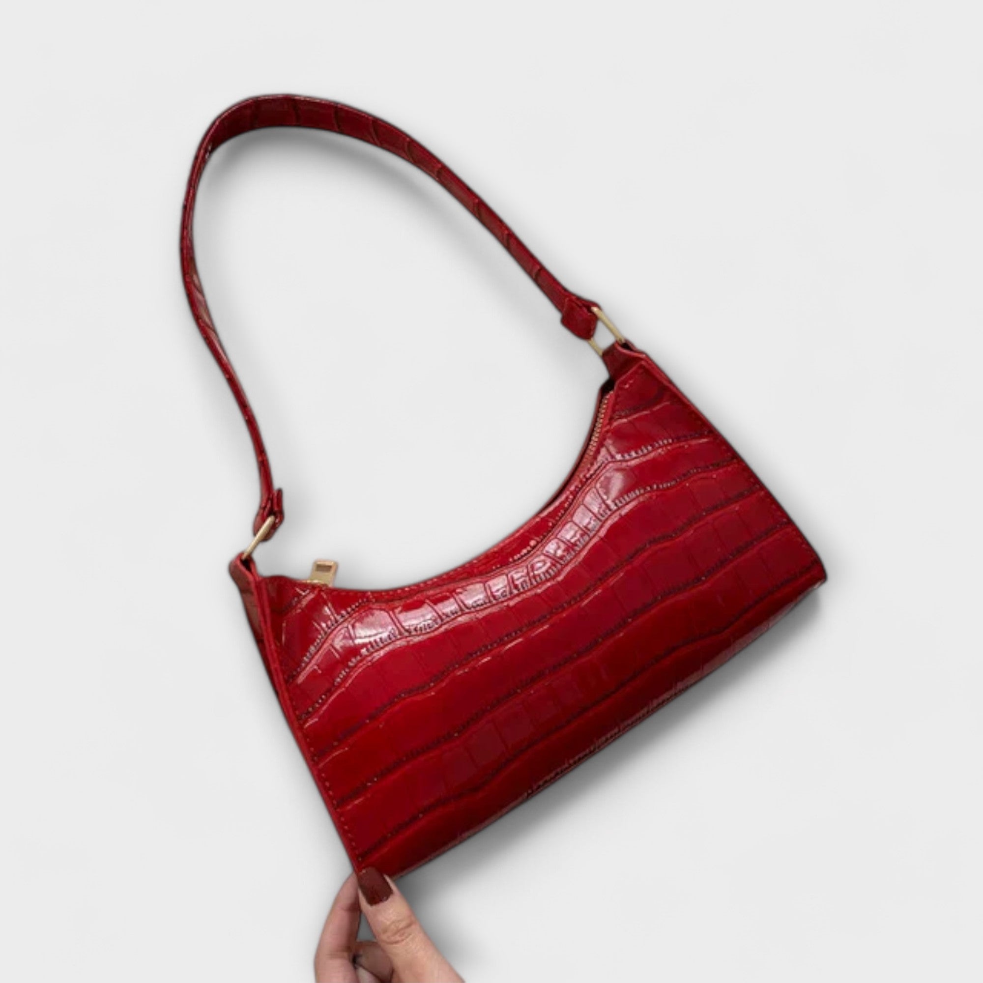 Aurora. - Glänzende Ledertasche
