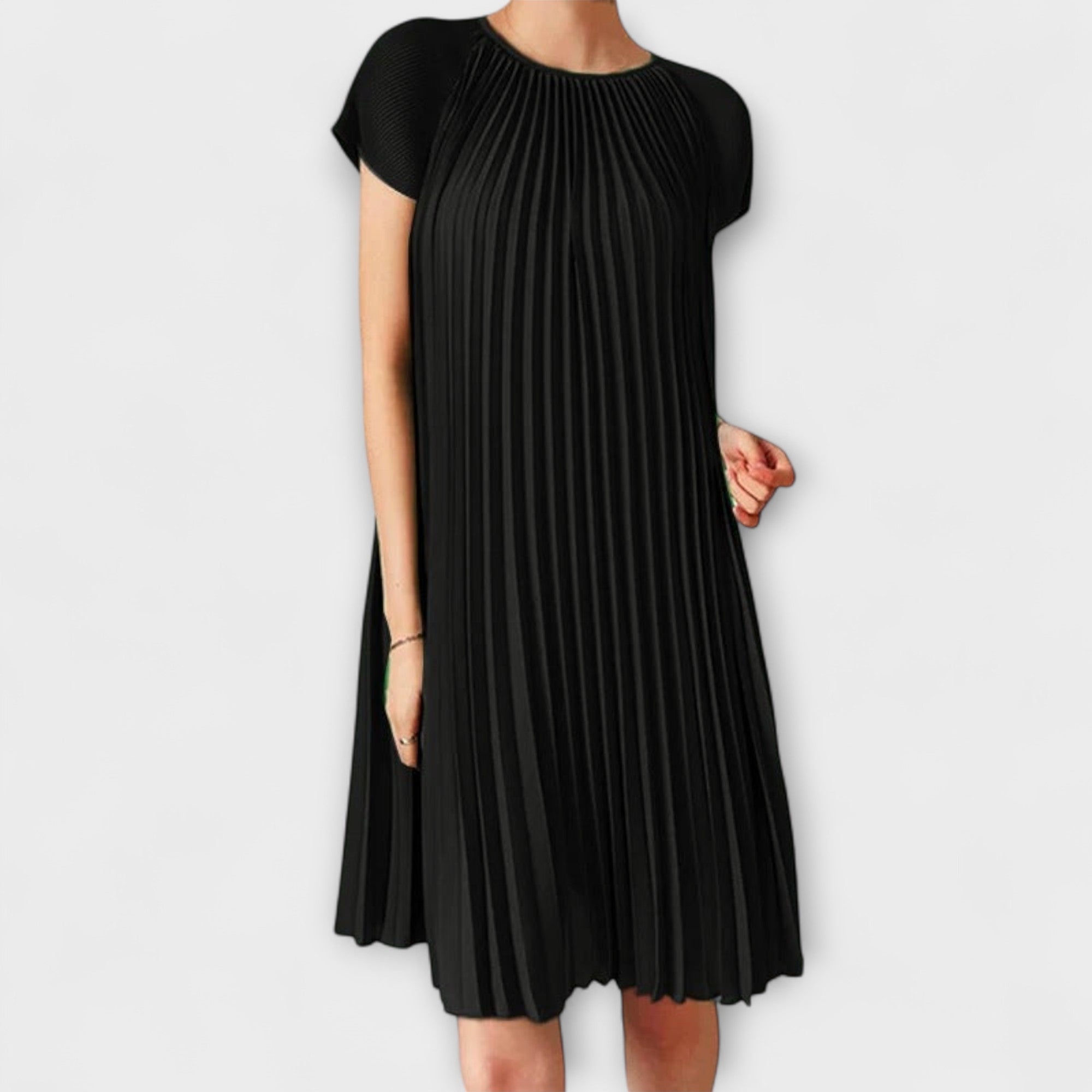The product title remains unchanged: "Elegantes Plisseekleid".